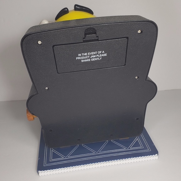 Yellow M&M on Black La-Z-Boy Dispenser - Picture 3 of 9